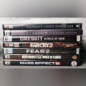 7 Mixed PC Games, Skyrim, Assassin's Creed, Call of Duty, Far cry, FEAR, +2 More